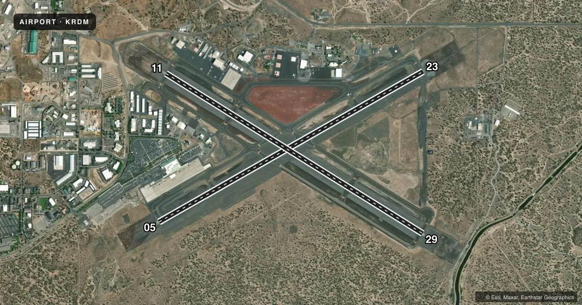 Top-down satellite sketch of KRDM ROBERTS FLD REDMOND MUNI in REDMOND, OREGON, showing runways 05/23, 11/29 drawn to scale over Esri World Imagery