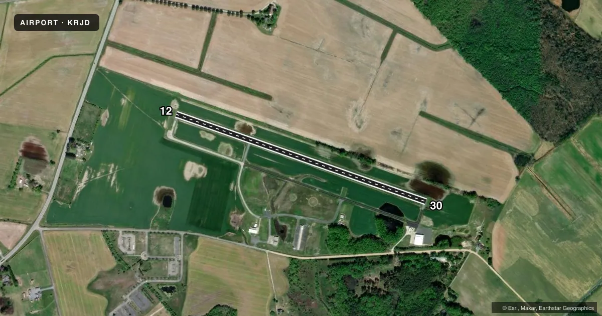 Top-down satellite sketch of KRJD GOODEN AIRPARK in RIDGELY, MARYLAND, showing runways 12/30 drawn to scale over Esri World Imagery