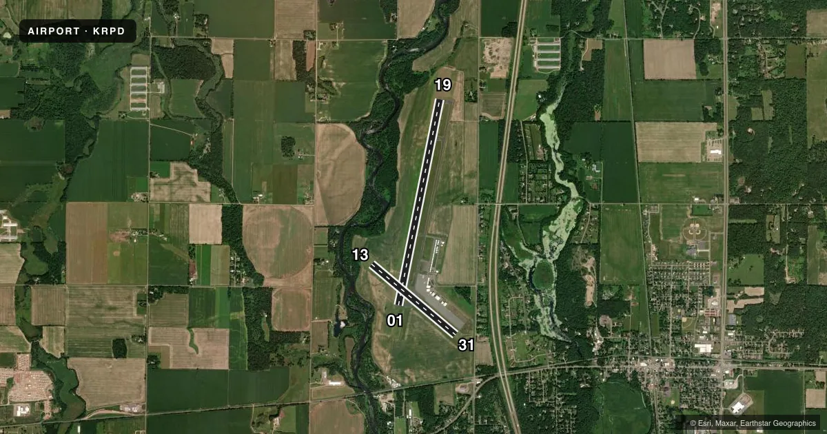 Top-down satellite sketch of KRPD RICE LAKE RGNL/CARL'S FLD in RICE LAKE, WISCONSIN, showing runways 01/19, 13/31 drawn to scale over Esri World Imagery