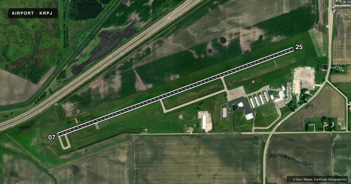 Top-down satellite sketch of KRPJ ROCHELLE MUNI/KORITZ FLD in ROCHELLE, ILLINOIS, showing runways 07/25 drawn to scale over Esri World Imagery