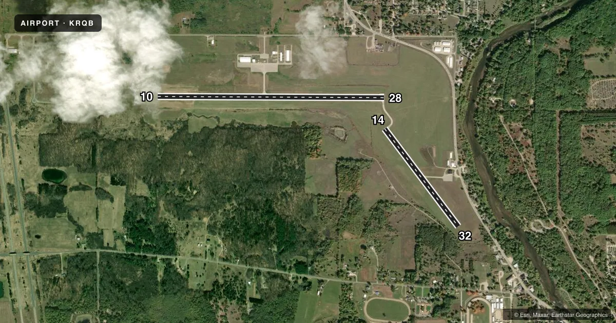 Top-down satellite sketch of KRQB ROBEN-HOOD in BIG RAPIDS, MICHIGAN, showing runways 10/28, 14/32 drawn to scale over Esri World Imagery