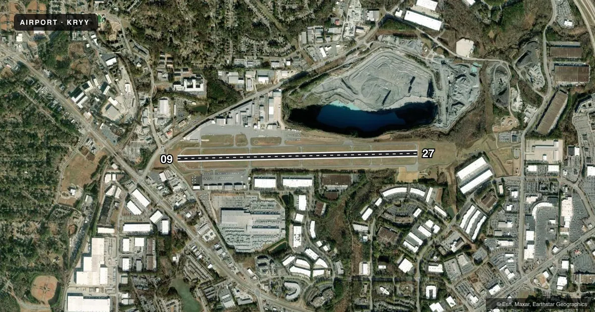 Top-down satellite sketch of KRYY COBB COUNTY INTL/MCCOLLUM FLD in ATLANTA, GEORGIA, showing runways 09/27 drawn to scale over Esri World Imagery