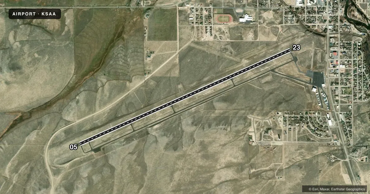Top-down satellite sketch of KSAA SHIVELY FLD in SARATOGA, WYOMING, showing runways 05/23 drawn to scale over Esri World Imagery