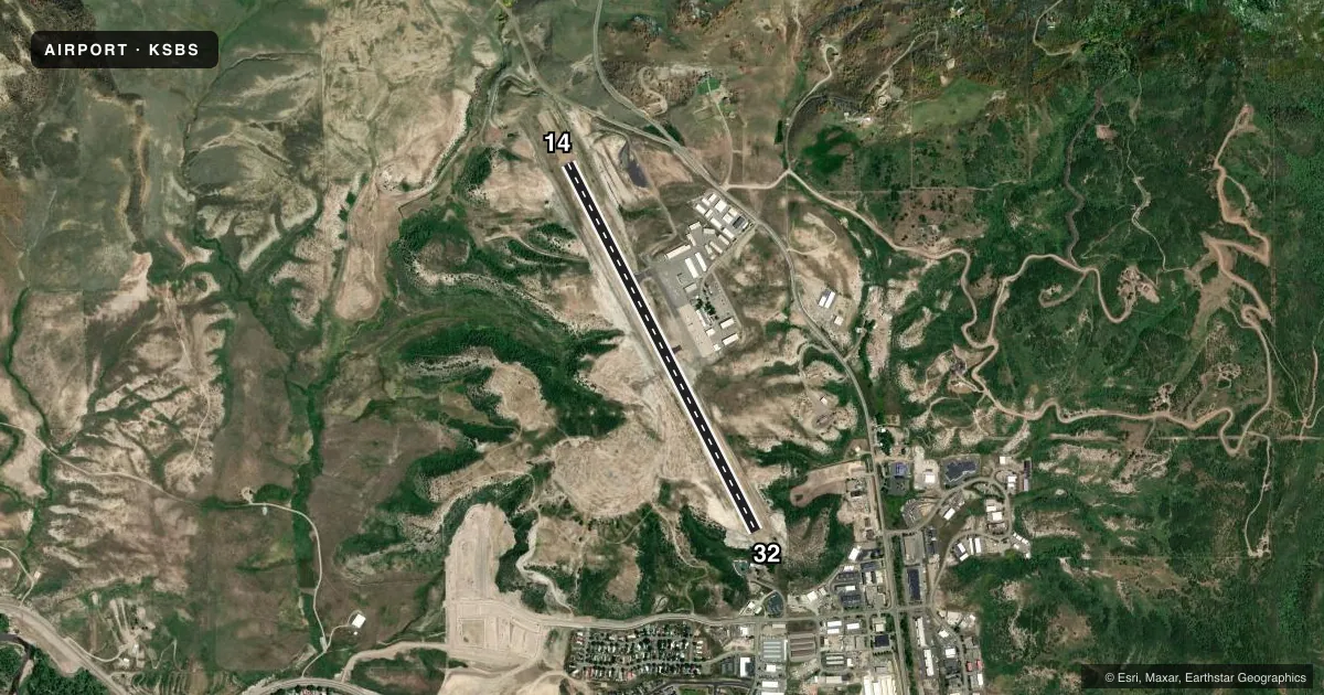 Top-down satellite sketch of KSBS STEAMBOAT SPRINGS/BOB ADAMS FLD in STEAMBOAT SPRINGS, COLORADO, showing runways 14/32 drawn to scale over Esri World Imagery