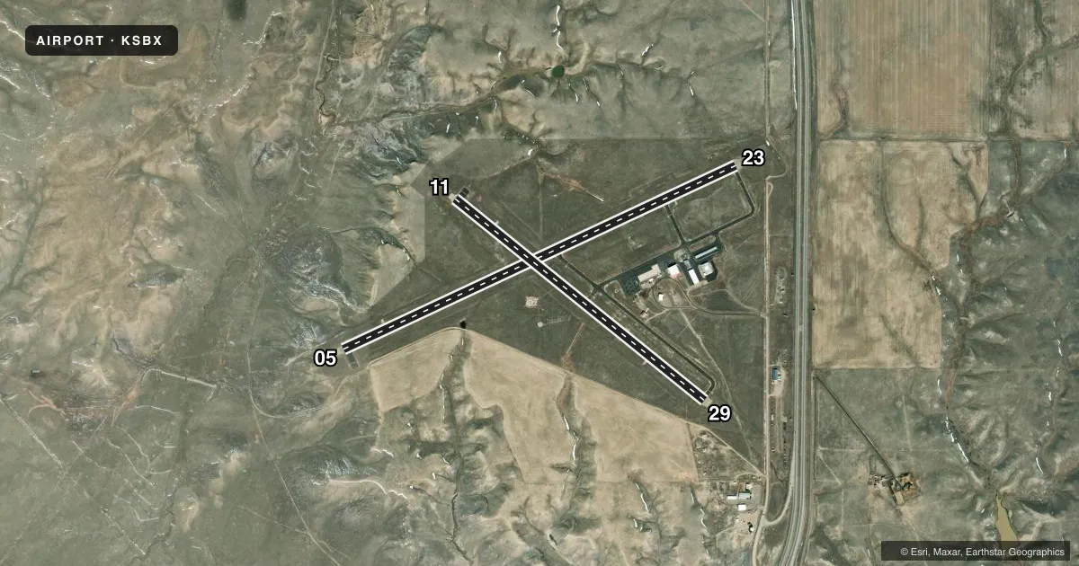 Top-down satellite sketch of KSBX SHELBY in SHELBY, MONTANA, showing runways 05/23, 11/29 drawn to scale over Esri World Imagery