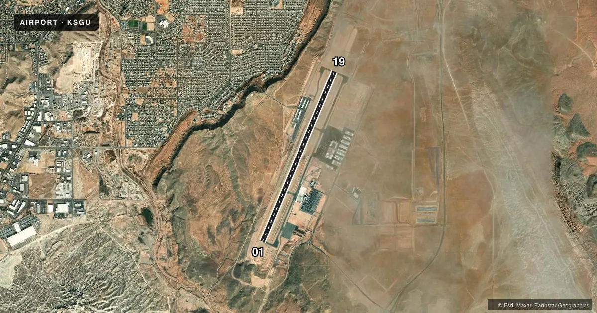 Top-down satellite sketch of KSGU ST GEORGE RGNL in ST GEORGE, UTAH, showing runways 01/19 drawn to scale over Esri World Imagery