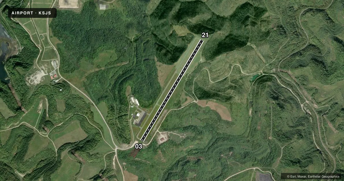 Top-down satellite sketch of KSJS BIG SANDY RGNL in PRESTONSBURG, KENTUCKY, showing runways 03/21 drawn to scale over Esri World Imagery