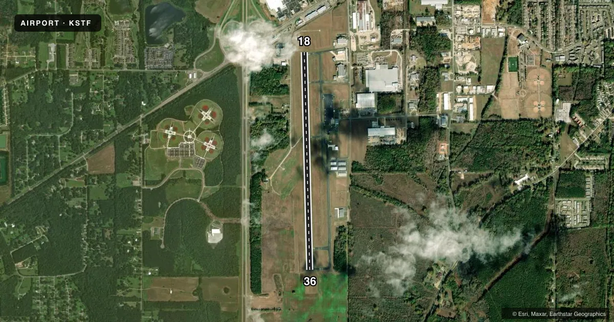 Top-down satellite sketch of KSTF GEORGE M BRYAN in STARKVILLE, MISSISSIPPI, showing runways 18/36 drawn to scale over Esri World Imagery