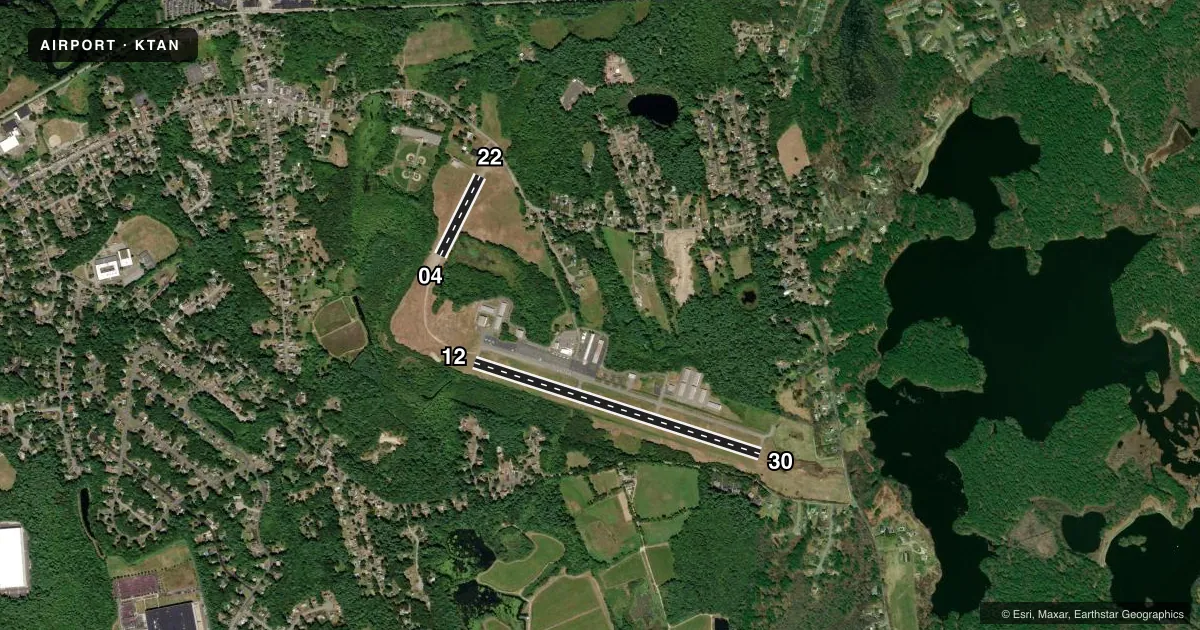 Top-down satellite sketch of KTAN TAUNTON MUNI/KING FLD in TAUNTON, MASSACHUSETTS, showing runways 12/30, 04/22 drawn to scale over Esri World Imagery