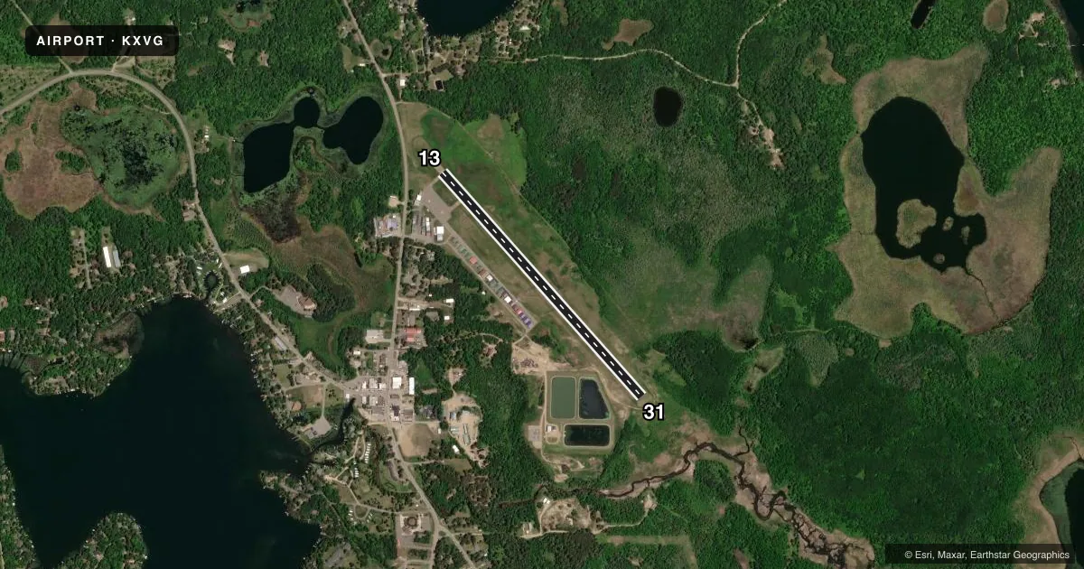 Top-down satellite sketch of KXVG LONGVILLE MUNI in LONGVILLE, MINNESOTA, showing runways 13/31 drawn to scale over Esri World Imagery
