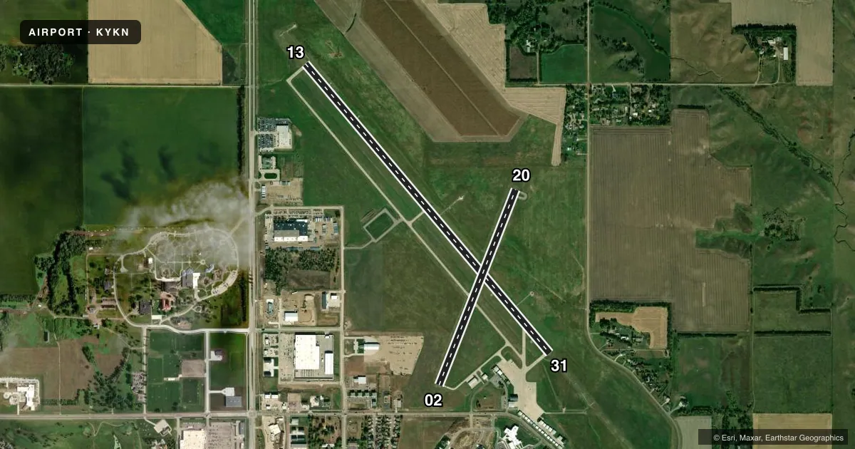 Top-down satellite sketch of KYKN CHAN GURNEY MUNI in YANKTON, SOUTH DAKOTA, showing runways 13/31, 02/20 drawn to scale over Esri World Imagery
