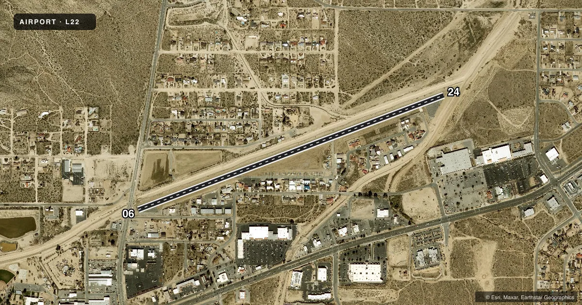 Top-down satellite sketch of L22 YUCCA VALLEY in YUCCA VALLEY, CALIFORNIA, showing runways 06/24 drawn to scale over Esri World Imagery