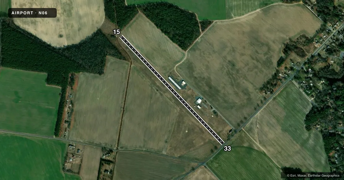 Top-down satellite sketch of N06 LAUREL in LAUREL, DELAWARE, showing runways 15/33 drawn to scale over Esri World Imagery