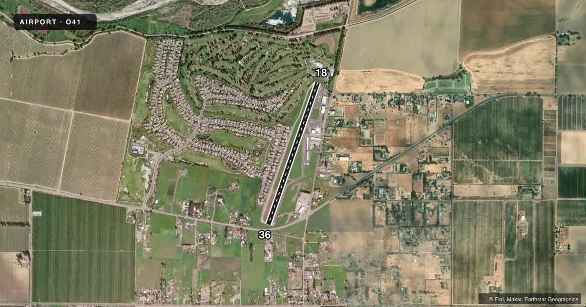 Top-down satellite sketch of O41 WATTS-WOODLAND in WOODLAND, CALIFORNIA, showing runways 18/36 drawn to scale over Esri World Imagery