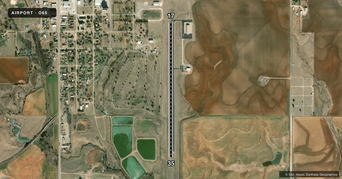 Top-down satellite sketch of O65 CHRISTMAN AIRFIELD in OKEENE, OKLAHOMA, showing runways 17/35 drawn to scale over Esri World Imagery