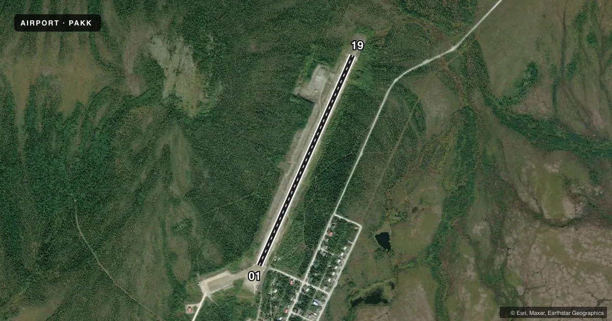 Top-down satellite sketch of PAKK KOYUK ALFRED ADAMS in KOYUK, ALASKA, showing runways 01/19 drawn to scale over Esri World Imagery