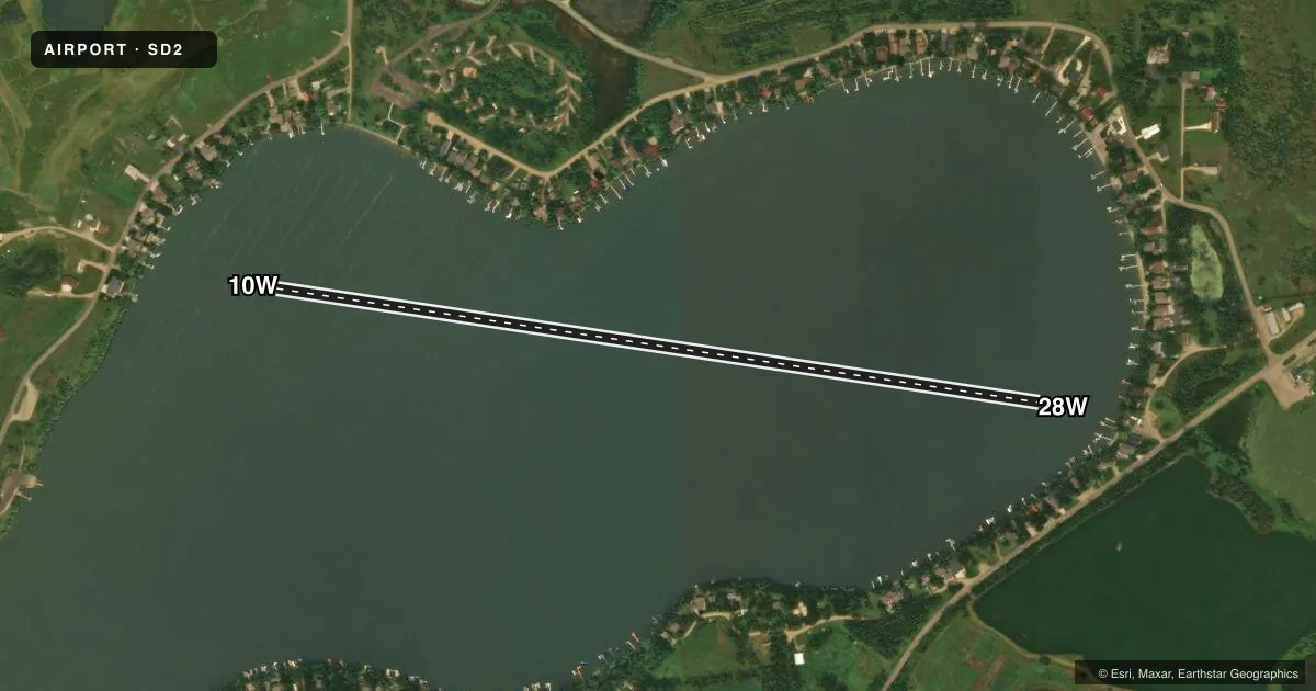 Top-down satellite sketch of SD2 LAKE COCHRANE in GARY, SOUTH DAKOTA, showing runways 10W/28W drawn to scale over Esri World Imagery