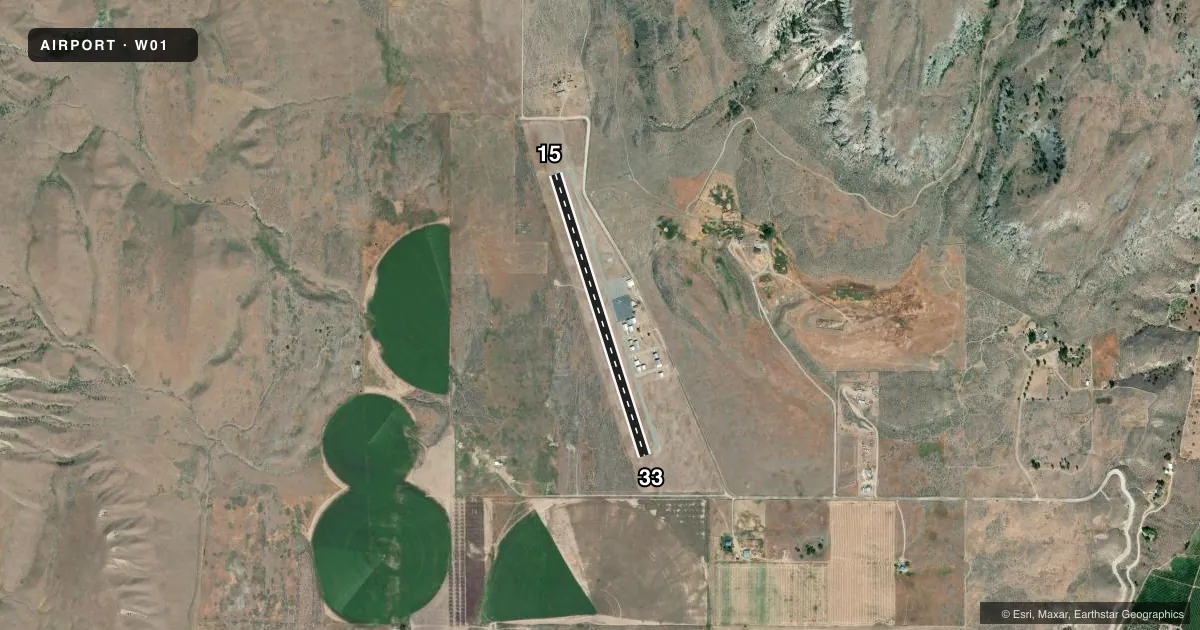 Top-down satellite sketch of W01 TONASKET MUNI in TONASKET, WASHINGTON, showing runways 15/33 drawn to scale over Esri World Imagery