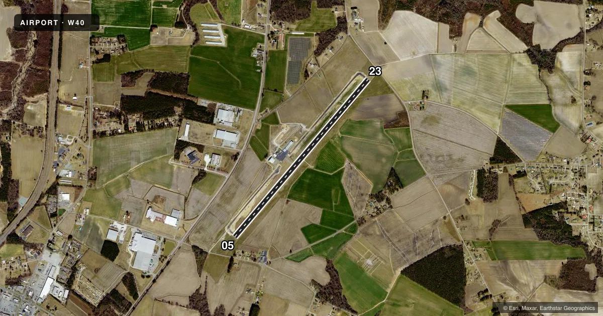 Top-down satellite sketch of W40 MOUNT OLIVE MUNI in MOUNT OLIVE, NORTH CAROLINA, showing runways 05/23 drawn to scale over Esri World Imagery