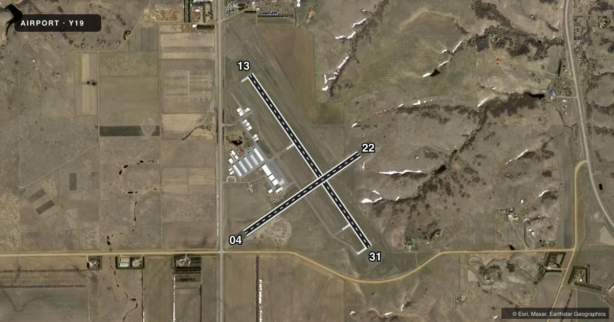 Top-down satellite sketch of Y19 MANDAN RGNL/LAWLER FLD in MANDAN, NORTH DAKOTA, showing runways 13/31, 04/22 drawn to scale over Esri World Imagery